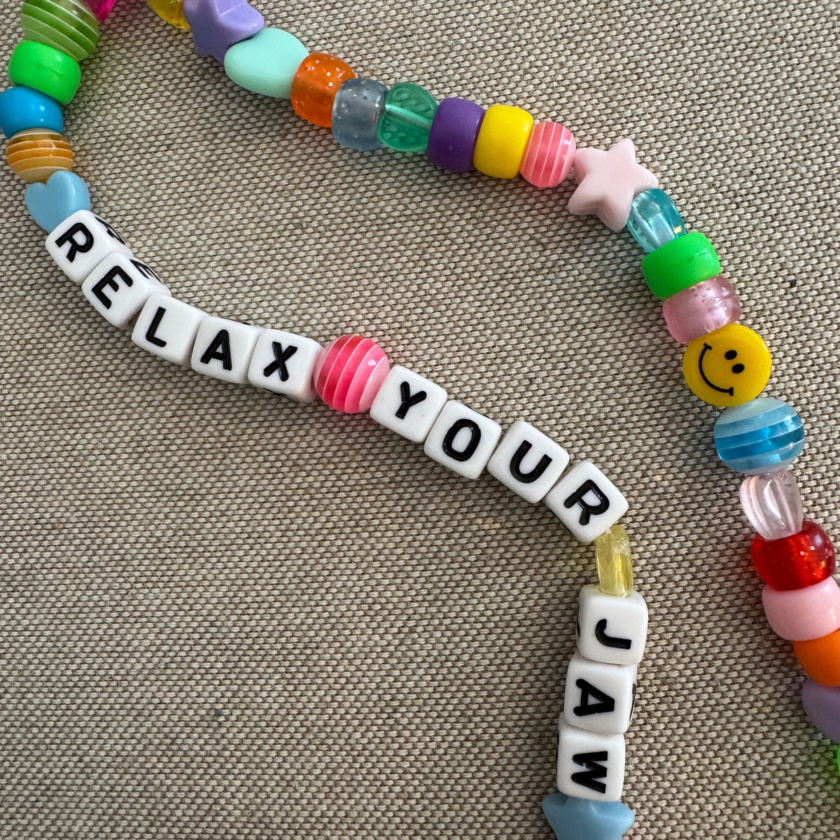 Relax Your Jaw Phone Charm