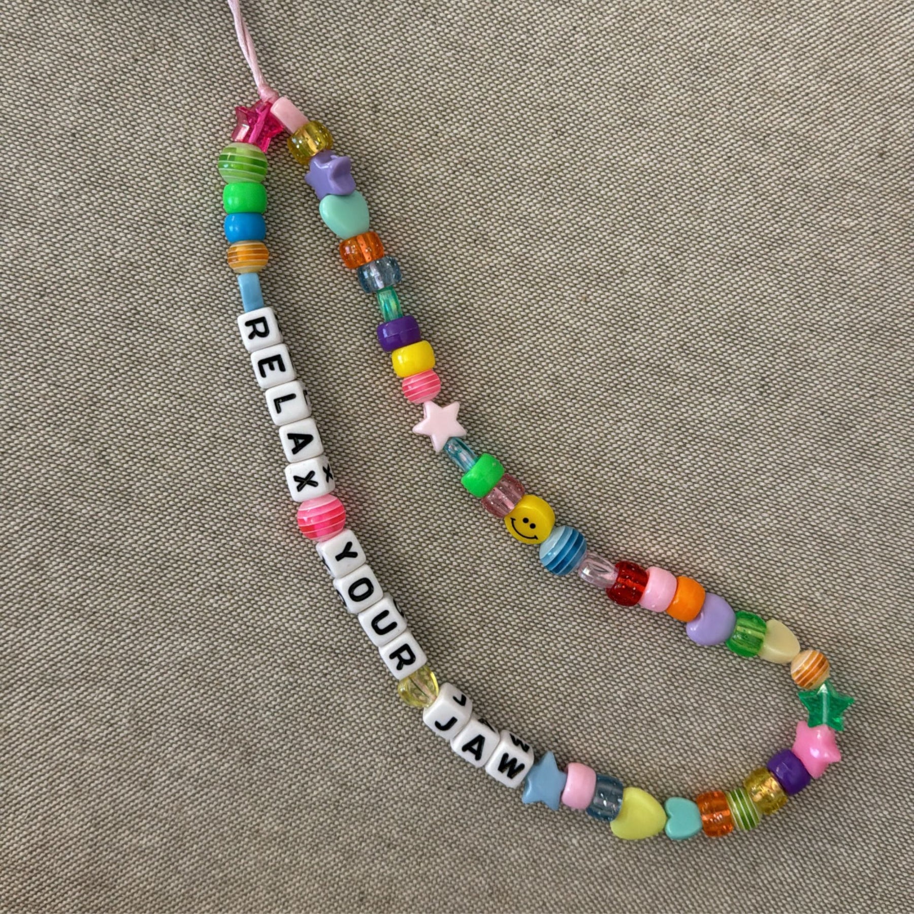 Relax Your Jaw Phone Charm