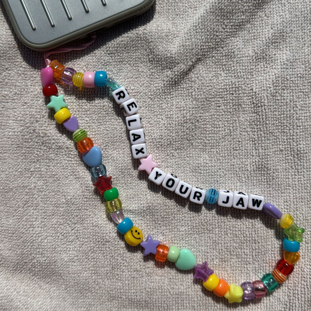 Relax Your Jaw Phone Charm