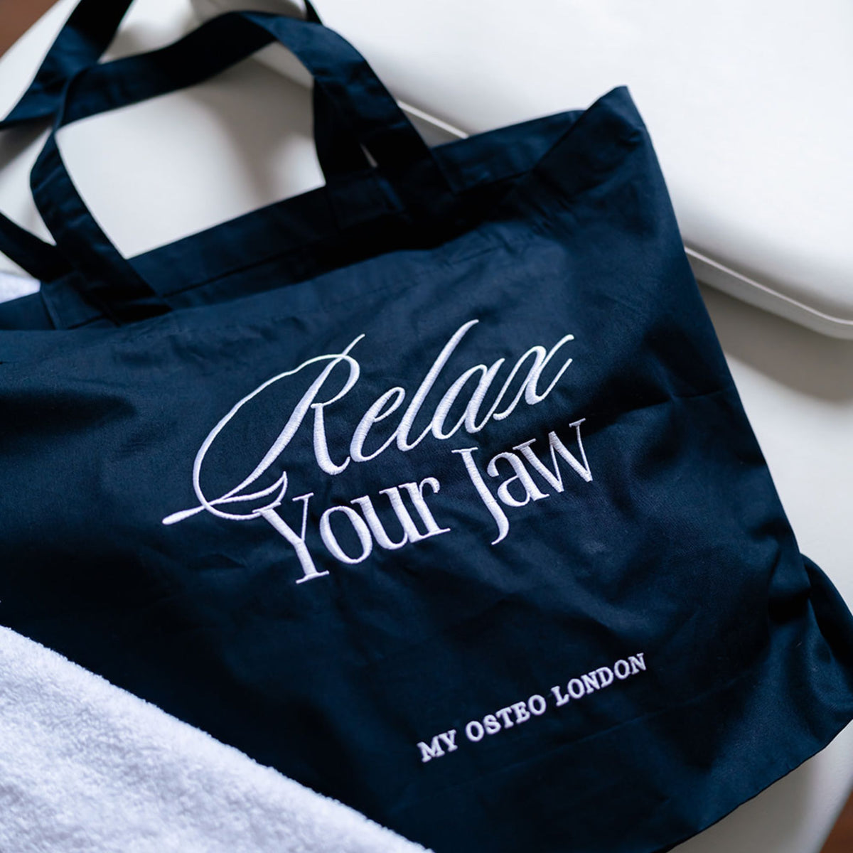 Relax Your Jaw Tote Bag