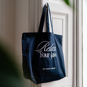 Relax Your Jaw Tote Bag