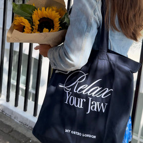 Relax Your Jaw Tote Bag