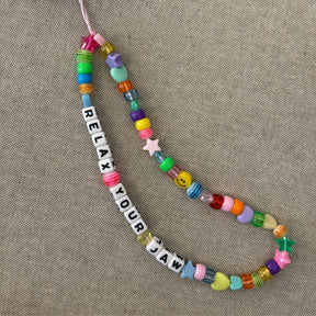 Relax Your Jaw Phone Charm